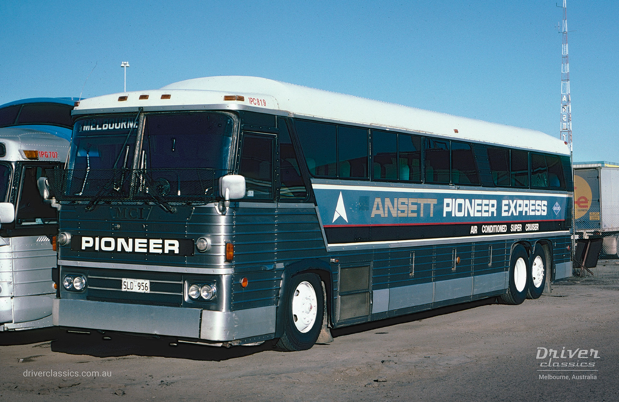 MCI MC8 bus in Ansett Pioneer original livery colours, Also 1967 GM PD-4107. Photo taken in 1981.