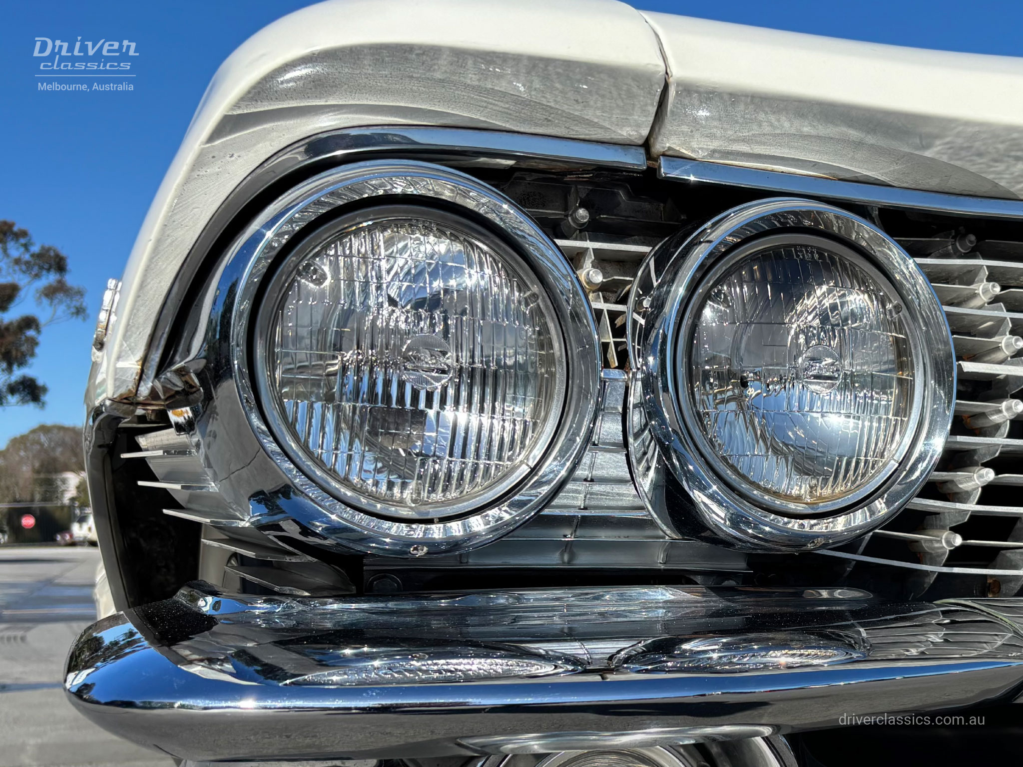 Cadillac Coupe de Ville (1961 Model), Headlight area close up. Photo taken at Mt Waverley VIC, September 2026